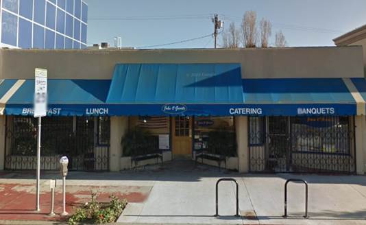 A building with a blue awning
Description automatically generated with low confidence