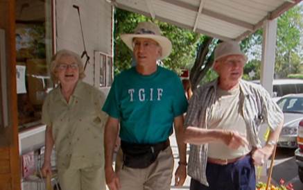 A group of people standing outside a building

Description automatically generated with low confidence