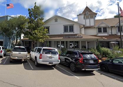 A group of cars parked outside a building

Description automatically generated with low confidence