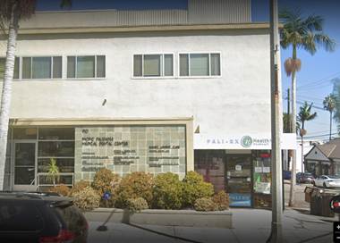 A picture containing text, building, outdoor, apartment building

Description automatically generated